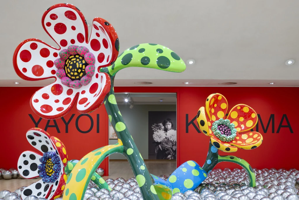 Yayoi Kusama with 'Yellow Tree / Living Room' at the Aichi Triennale, 2010 