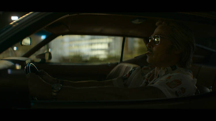 Brad Pitt as Cliff Booth in 'The Further Mis-Adventures of Cliff Booth' Brad Pitt sitting in his car as Cliff Booth in 'The Further Mis-Adventures of Cliff Booth'
