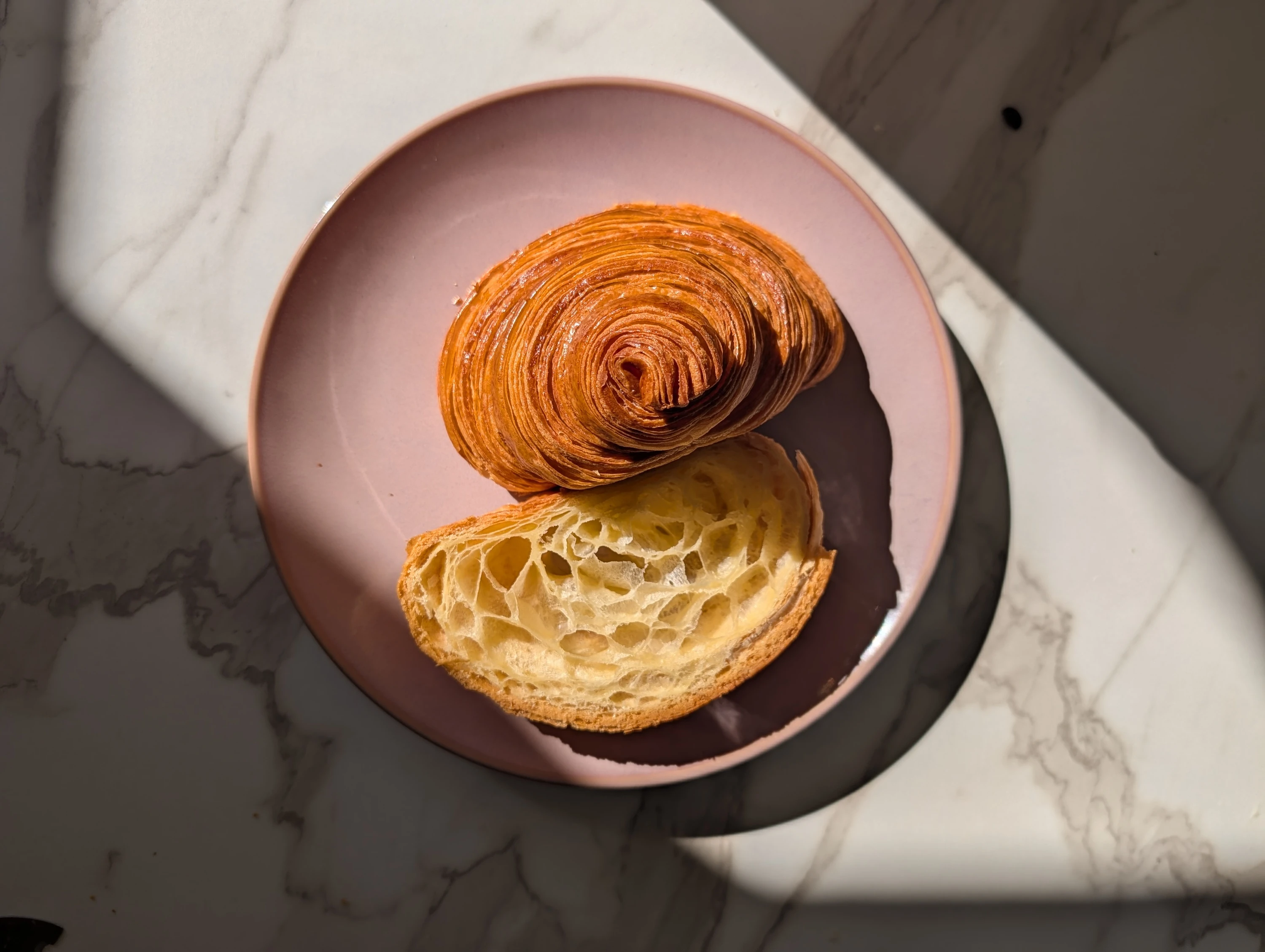 Plain croissant cut in half
