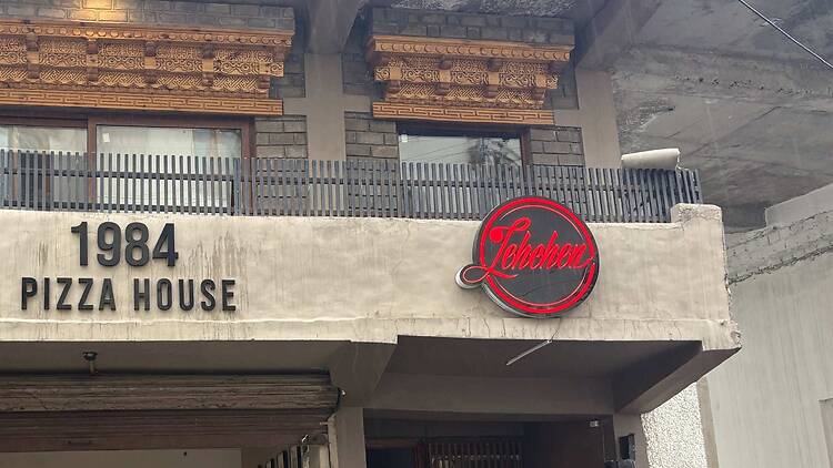 Lehchen bar exteriors with shingkos wood carvings