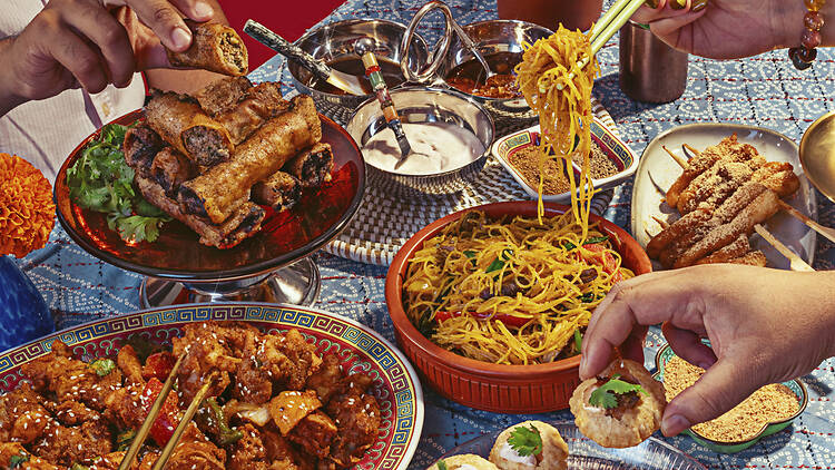Welcome to the Neighborhood A spread of Bengali and Fujianese foods with people grabbing at it