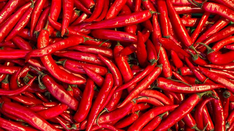 Big batch of fresh red chili peppers Big batch of fresh red chili peppers