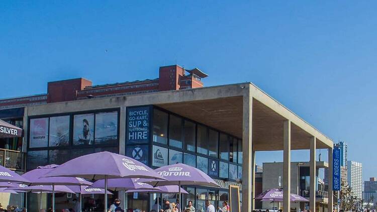 Surf Riders became a familiar stop on Durban’s South Beach, serving locals, surfers and visitors right on the Golden Mile. Surf Riders became a familiar stop on Durban’s South Beach, serving locals, surfers and visitors right on the Golden Mile.