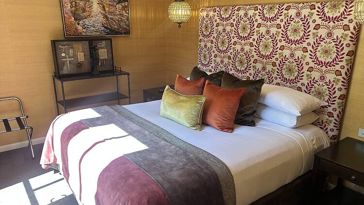 A bed in the Atrium Villa at Lake House Daylesford.