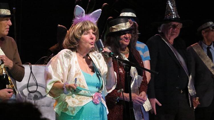 TNC'S VILLAGE HALLOWEEN COSTUME BALL -- Foreground: Crystal Field and Bina Sharif in costume judging at Theater for the New City's Village Halloween Costume Ball, 2014.  Photo by Jonathan Slaff.