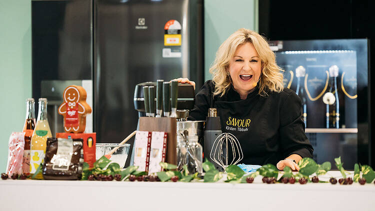 Chocolatier Kirsten Tibballs woman with Christmas goods and kitchen equipment