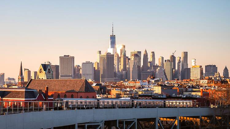 G train against the New York skyline G train against the New York skyline