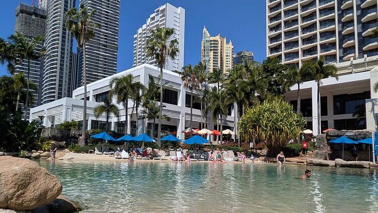 A sandy shore at a hotel pool