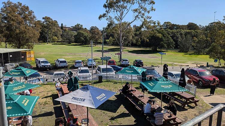 A beer garden with trees around