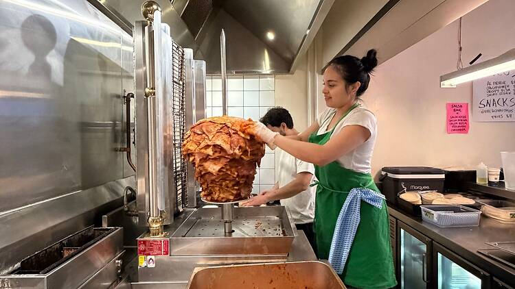 Staff working in Super Taco kitchen