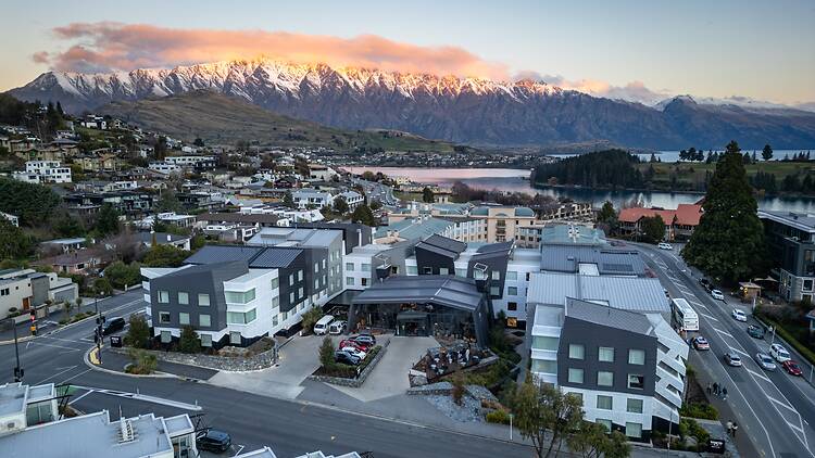 voco Queenstown with mountainscape in the background