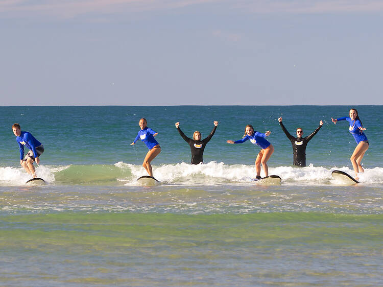 Take a surfing lesson Take a surfing lesson