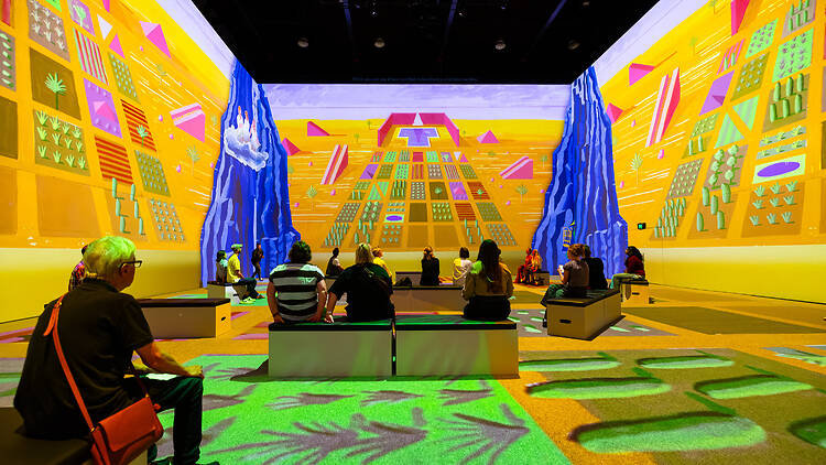 David Hockney: Bigger & Closer (not smaller & further away) at Carriageworks people looking at digital art