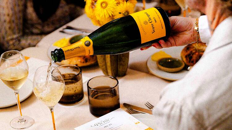 Veuve Clicquot Yellow Label being poured for Le Picnic at Fred's Veuve Clicquot Yellow Label being poured for Le Picnic at Fred's
