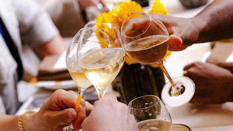 Cheersing glasses of Veuve Clicquot Yellow Label for Le Picnic at Fred's Cheersing glasses of Veuve Clicquot Yellow Label for Le Picnic at Fred's