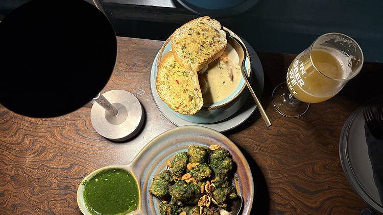 Andhra green chilli chicken with peanuts and Cerveza prawn gambas, two of the best things on Fort City's food menu