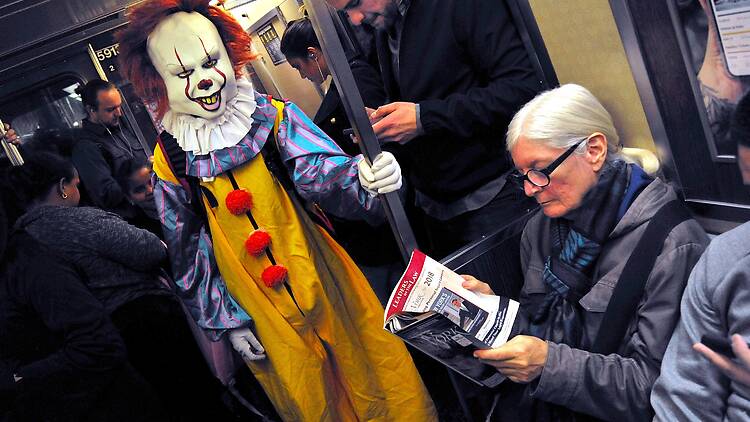 Costumed Halloween reveler takes the New York subway Costumed Halloween reveler takes the New York subway
