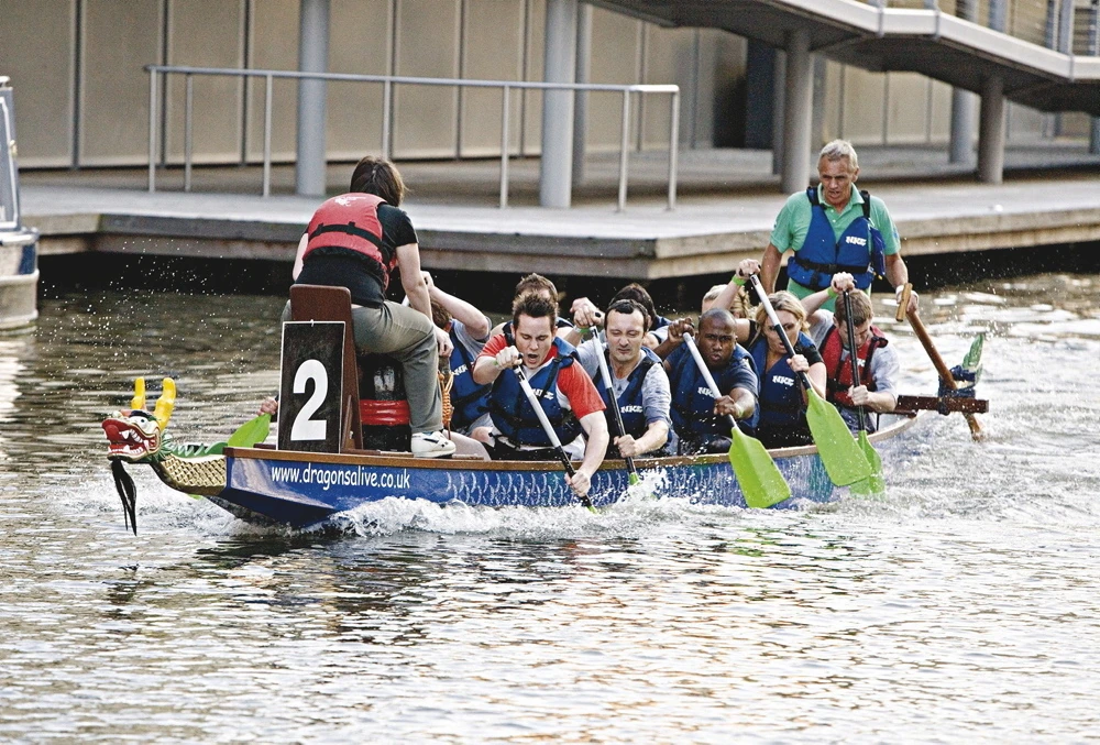 A boat racing in the London Dragon Boat Regatta