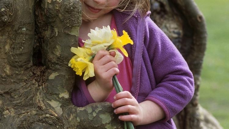 Child with Spring posy by tree (2).jpg