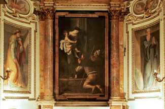 Madonna of the Pilgrims by Caravaggio at the church of Sant’Agostino in Rome